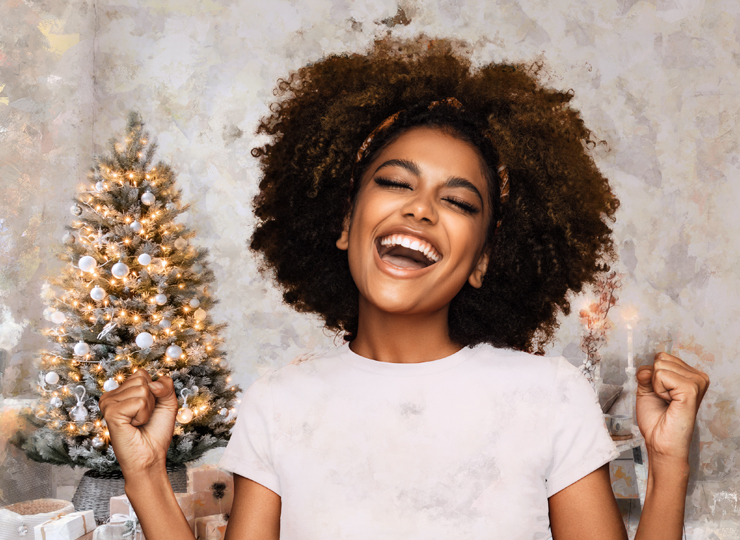 Women smiling celebrating her More for You Christmas loan from First Citizens