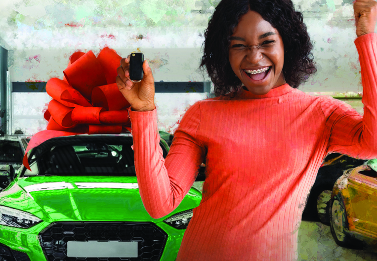 Girl smiling with a brand-new car this Christmas, thanks to a First Citizens car loan