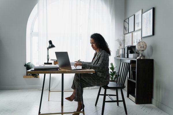 Business professional in her office signed into the trading platform from First Citizens Investment Services.