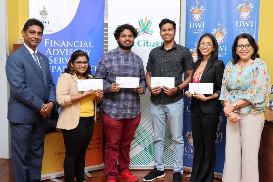 Four uwi undergraduates smiles with their first citizens bursaries.