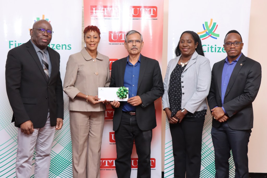 Mrs. Nadine Harding-Mohan, Cluster Manager – South, First Citizens at the UTT Point Lisas Campus.

(l-r) Vice President, Research, Academic & Student Affairs – Professor Stephen Joseph, Assistant Vice President, Undergraduate Studies – Dr. Solange Kelly, and Alumni & Financial Aid Officer – Jesse Moss,