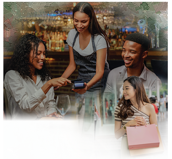 Business Chequing Account couple inside a restaurant paying with their card