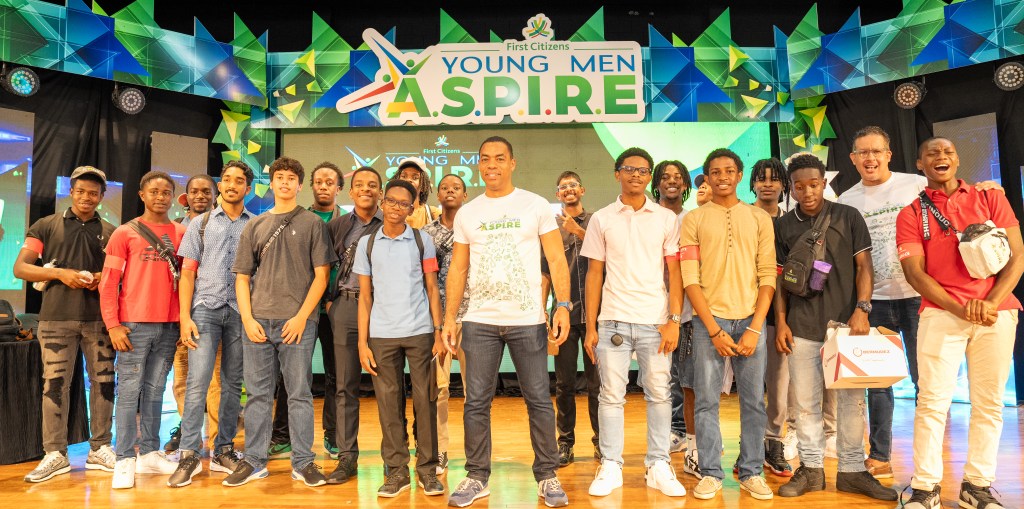 Here Jason Julien - Group Deputy CEO – Business Generation and Lead Game Changer (centre) celebrates with Mentors and participants of the winning Team in Trinidad following the conclusion of a series of team challenges