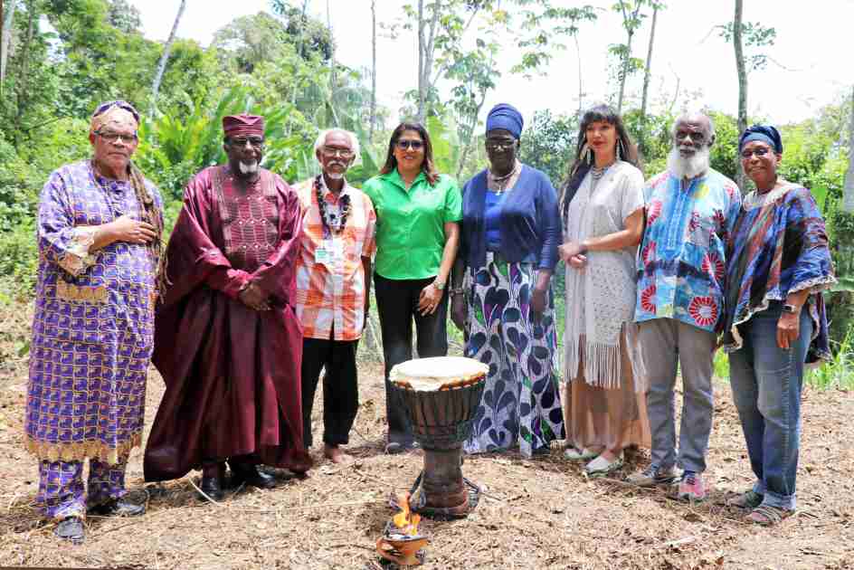The Consecration Participants following the Blessing of the Ground (l-r): Mr. Everald “Redman” Watson – Drummer; Elder Equino Moyo – Director/Mathematician, ESCTT; Mr. Raould Warao – Warao Shaman; Mrs. Neela Moonilal-Kissoon – Group Deputy CEO-Operations and Administration, First Citizens; Ms. Zakiya Uzouma Wadada – Executive Chair, ESCTT; Cacica Anicia Bermudez-Benjamin – Warao Nation; Mr. Khafra Kambon – Director, ESCTT and Dr. Asha Kambon – Public Policy Expert and Social Impact Assessor, ESCTT.
