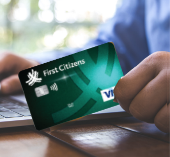 Someone holding a First Citizens Credit Card